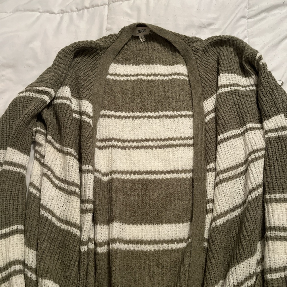 Green and white cardigan